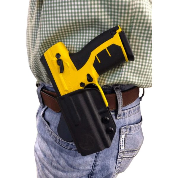 Byrna Tactical Holster holding a yellow Byrna worn by man