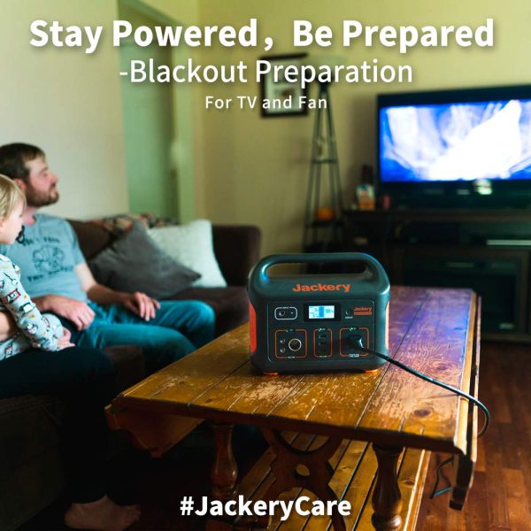 Jackery Explorer 500 Portable Power Station powering a TV set