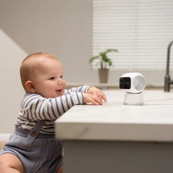 Eufy S350 Indoor Dual Lens 4K Wifi Camera on table monitoring baby