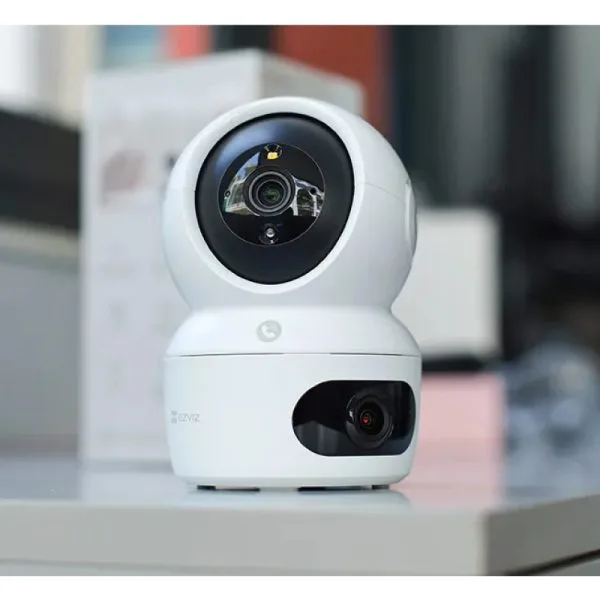 EZVIZ H7c 2K+ Dual-Lens Pan & Tilt WiFi Camera positioned on a table